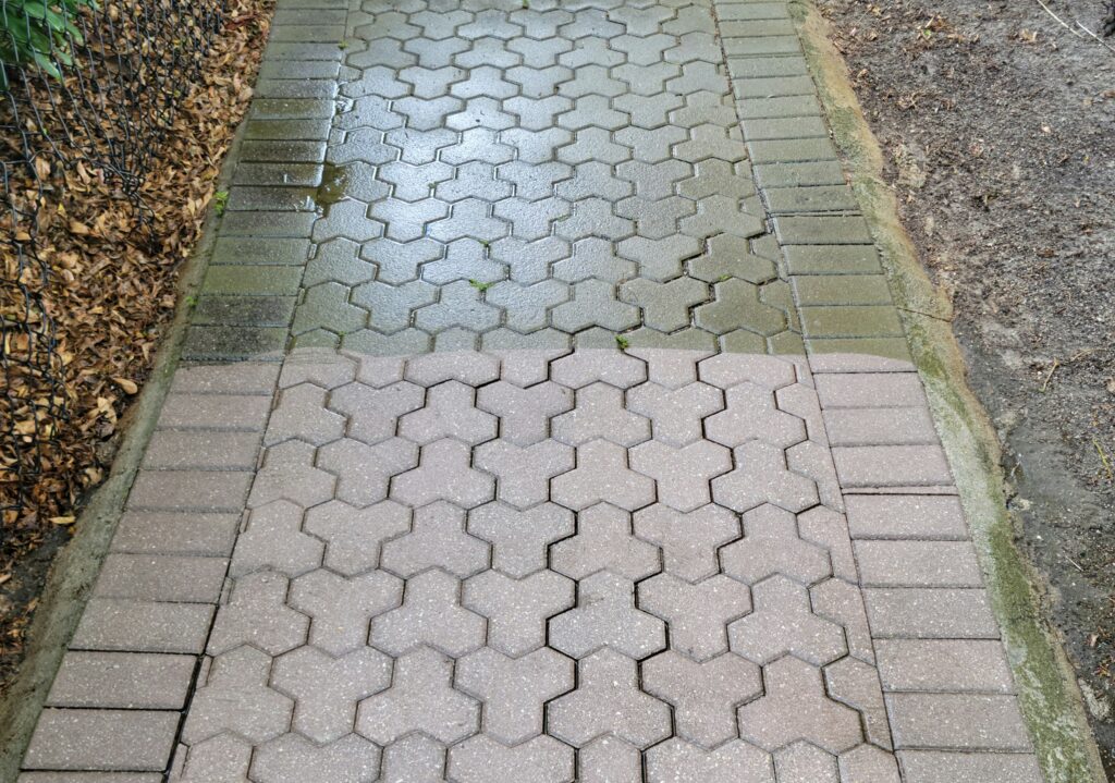 Before and after view of a paver path cleaned by Pinnacle Pressure Cleaning and Sealing, LLC in Naples, FL.