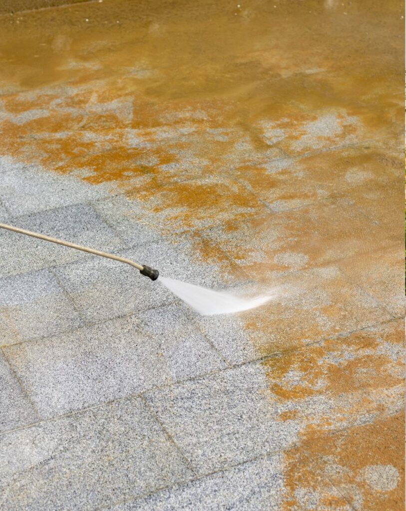 Effective surface cleaning of a patio by Pinnacle Pressure Cleaning and Sealing, LLC in Naples, FL.